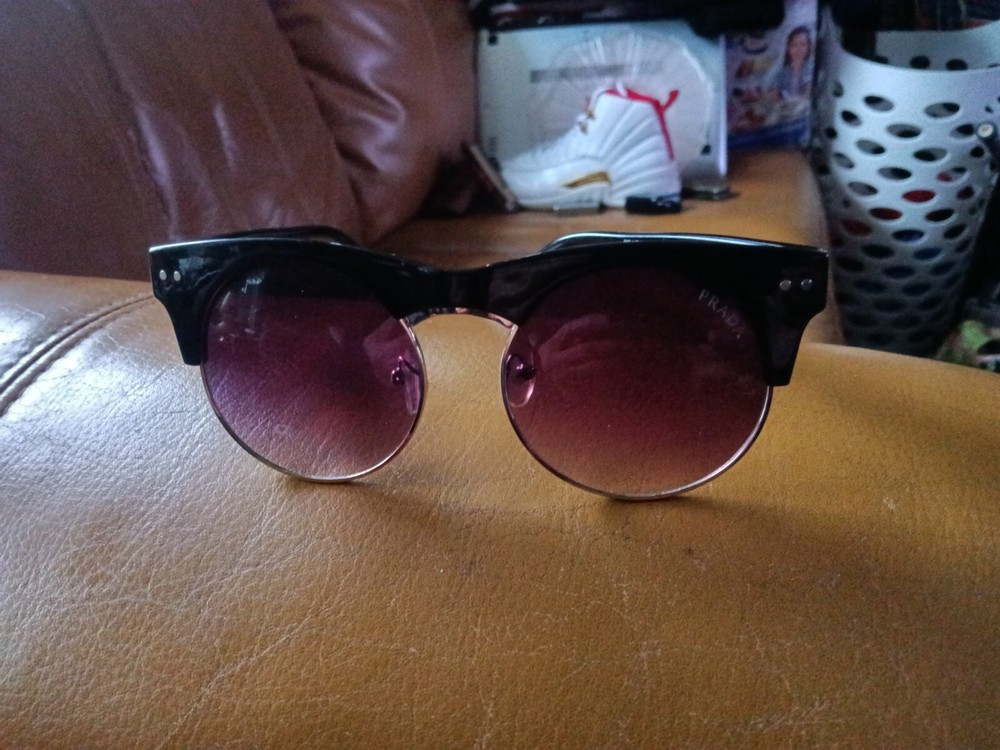 Prada luxury sunglasses for men and women