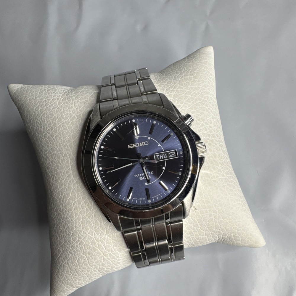 Seiko Men’s Watch 5M63-0AH0 KineticBlue Dial Silver Tone Day Date Skeleton Back