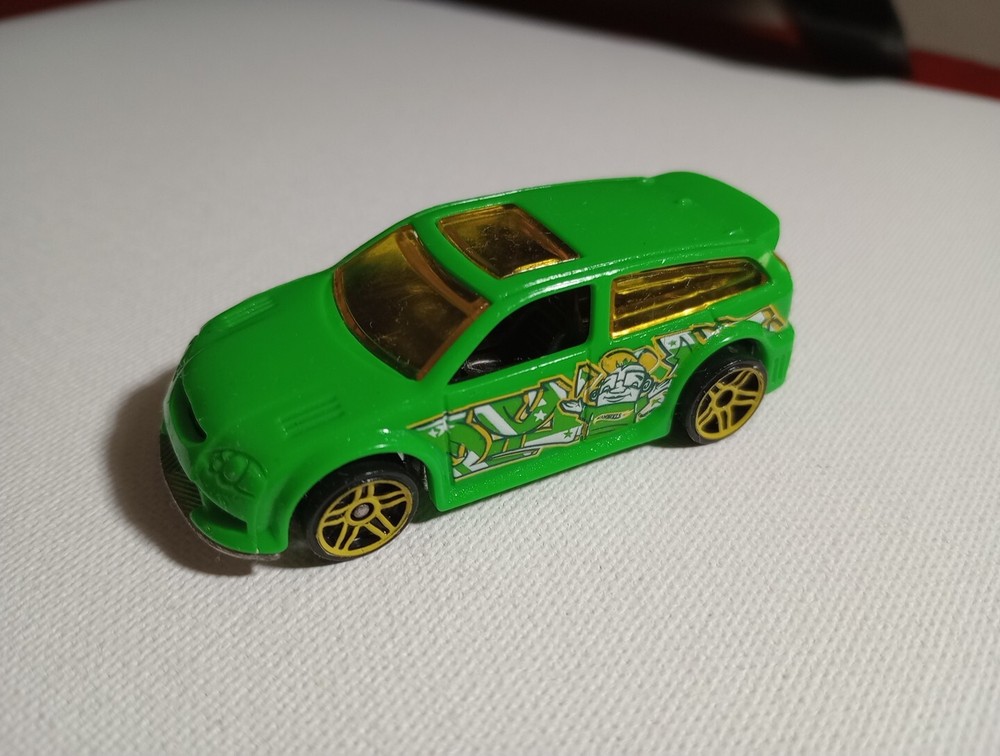 2011 Hotwheels Neon Green Audacious Graffiti Ride SUV 5sp Yellow Wheels Loose.