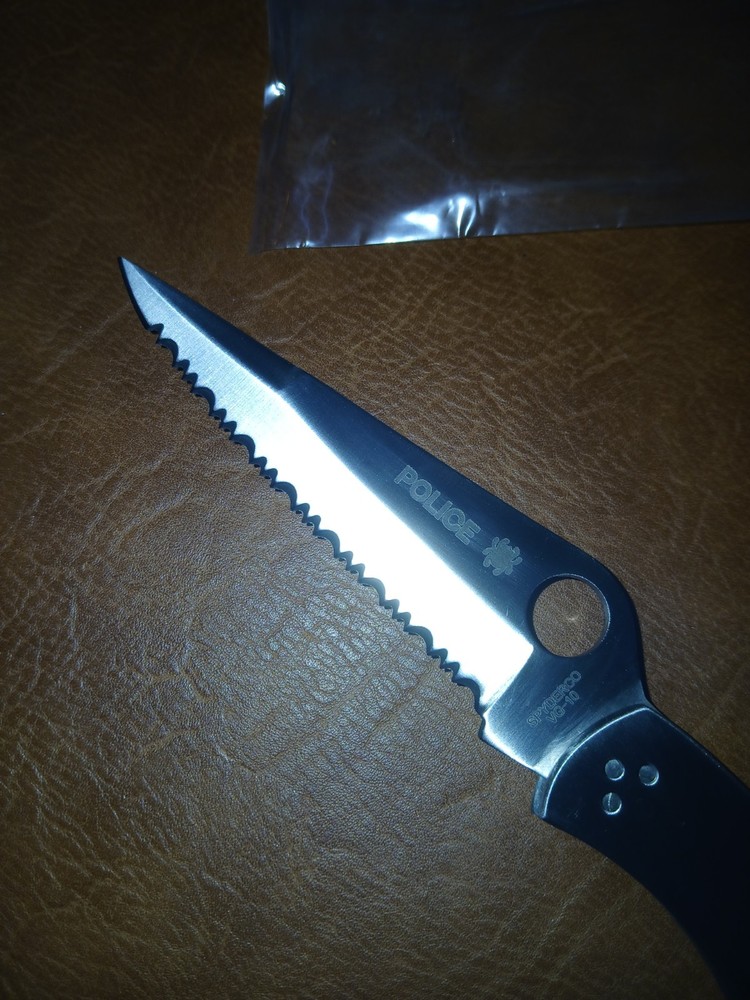 Spyderco Police Stainless Steel Folding Pocket Knife - Silver Serrated Blade