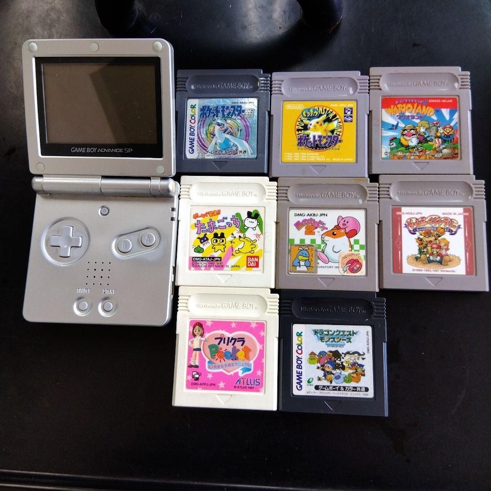 Game Boy Advance SP And 8 Game Cartridges Set