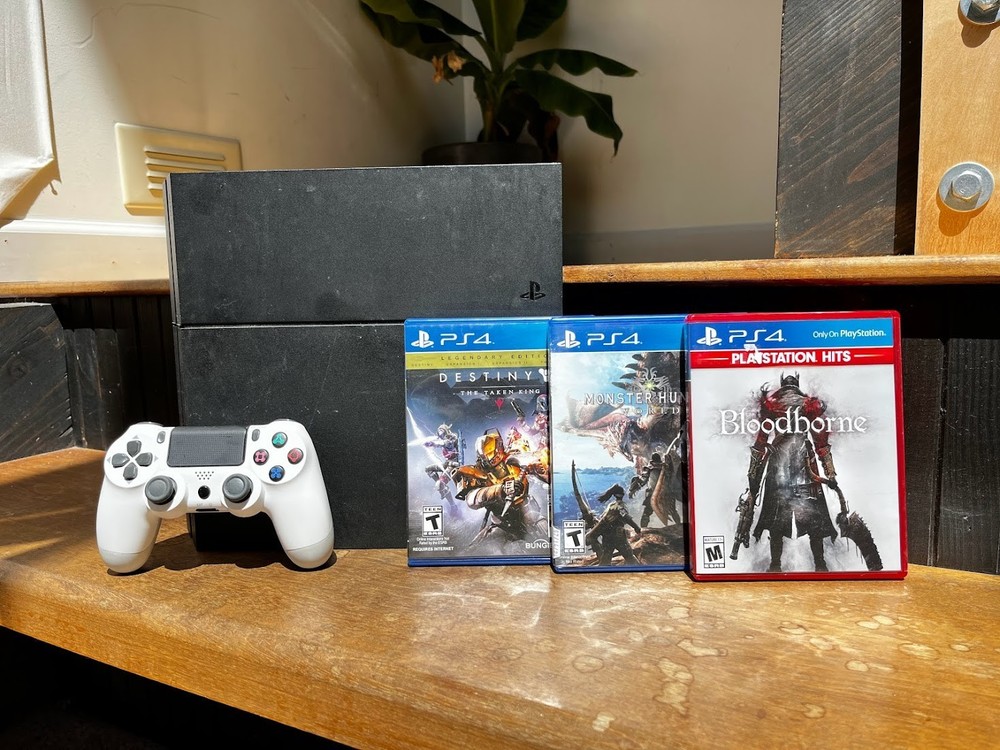 Black PlayStation 4 Bundle with 2 Wireless Controllers & 3 Games – Amazing Deal