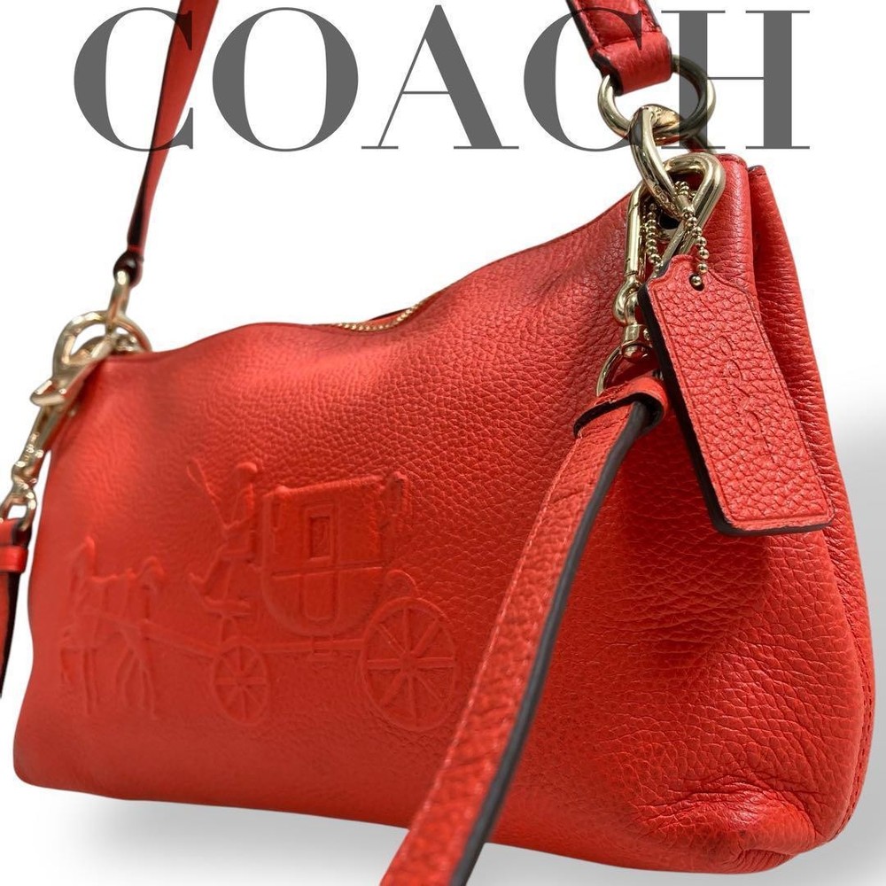 Coach two-way shoulder bag with hand carry and adjustable crossbody strap