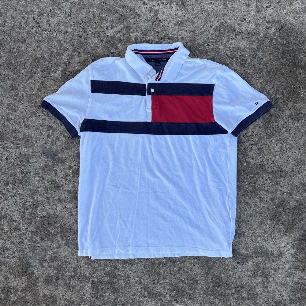 White Tommy Hilfiger polo shirt with bold red and navy accents #preppySize: XL