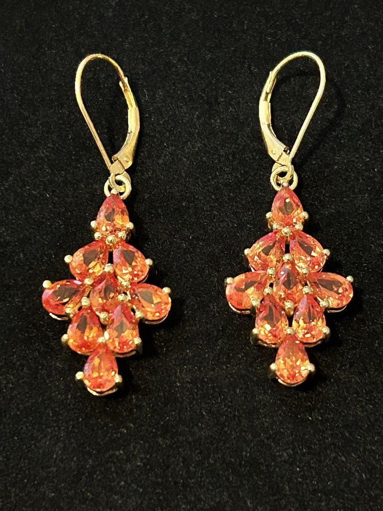 9.18 ctw pear shaped Padparadscha sapphire, 18k gold over silver earrings