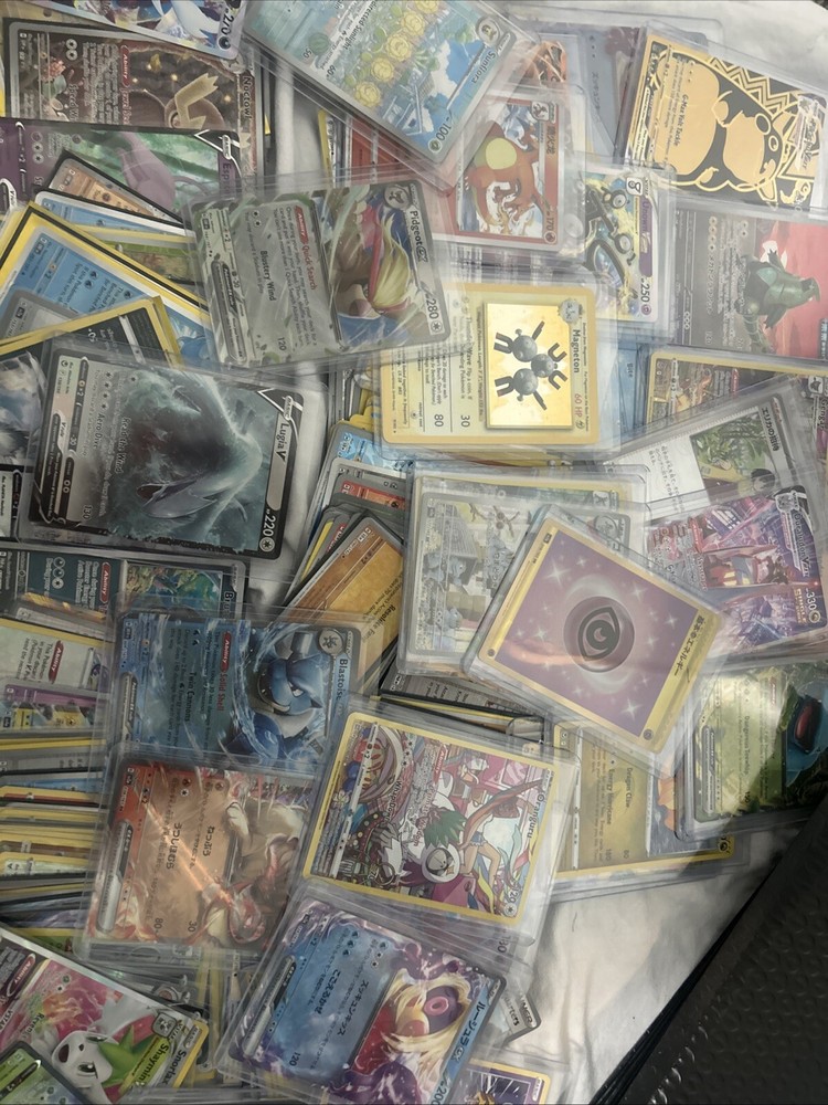 pokemon cards mystery package garente 3 holos 3 reverse holos and 1 V or better