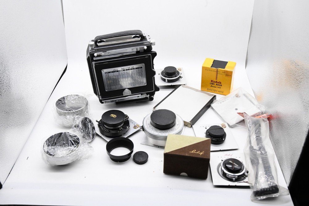 Linhof 4x5 camera with 5 perfect lenses, flash, and four lens hoods