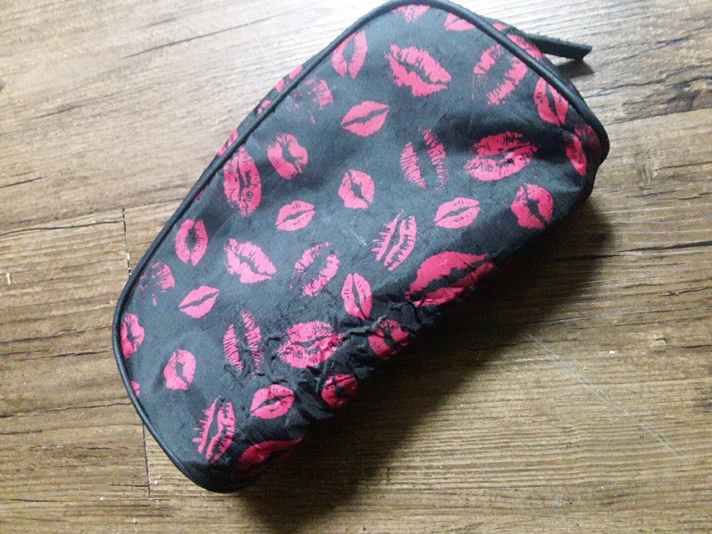 Avon Black Makeup Bag with Lip Kisses Design