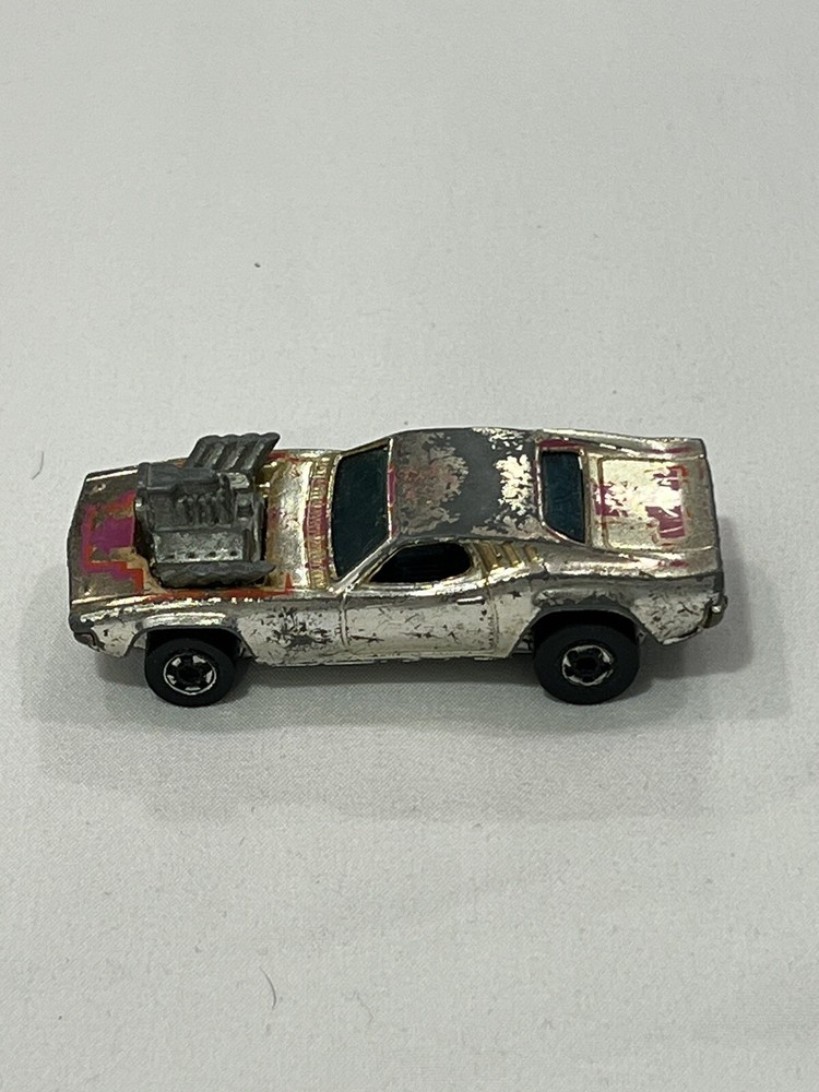 Hot Wheels Rodger Dodger Race Car Black Walls Chrome Gold Hong Kong 1970 Mattel