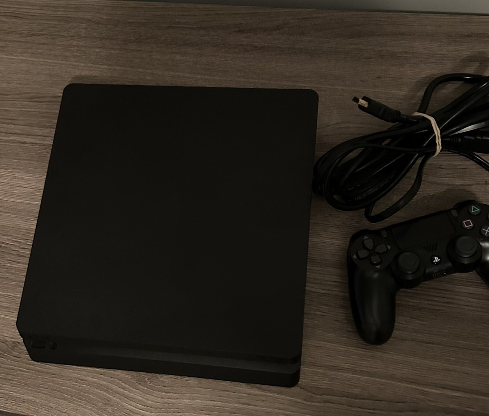 Sony PlayStation 4 Slim 1TB with DualShock Controller in Black