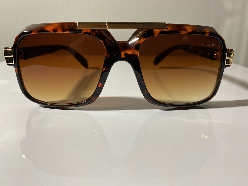 Tortoise pattern frame men's sunglasses with brown lenses. Old school classics.