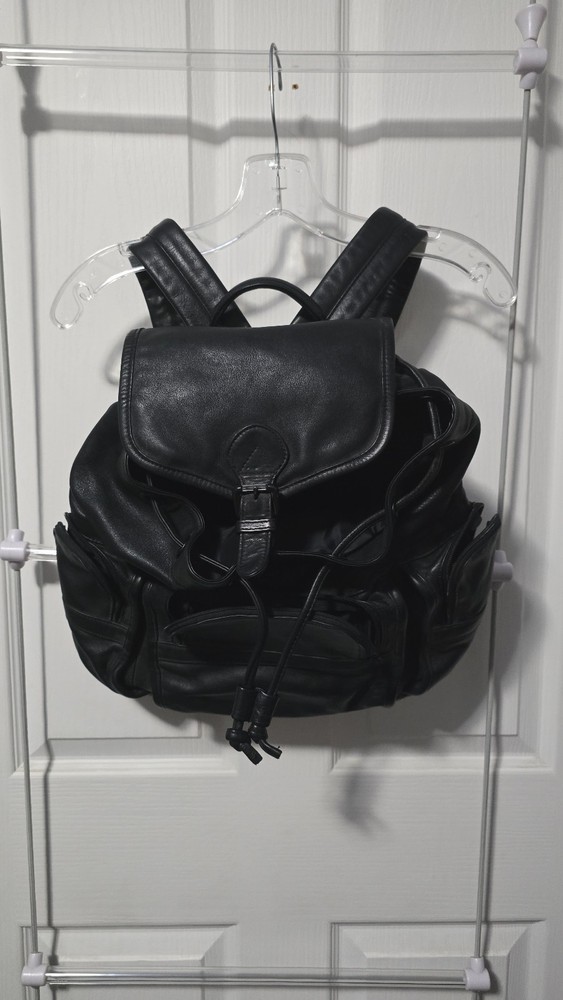 Tumi Black Genuine Leather Woman's Drawstring Backpack/Hand Bag Adjustable