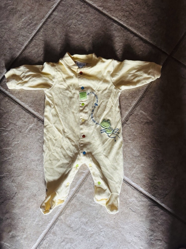 Vintage yellow checkered baby footed sleeper with a frog appliqué.