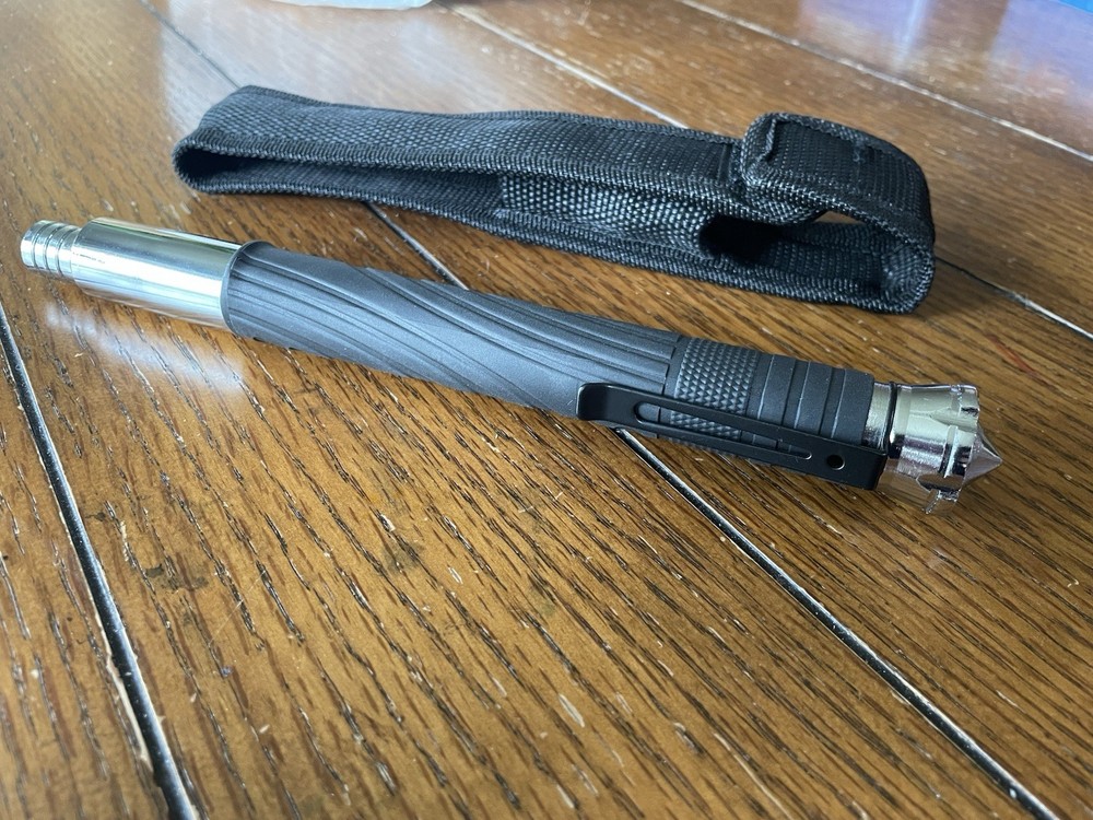 22 Inch Expandable Walking Stick with Window Breaker Belt Clip and Holster