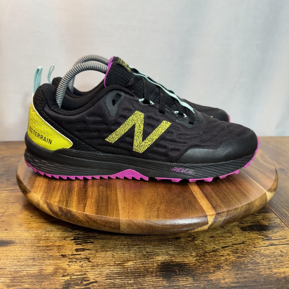 New Balance Nitrel All Terrain Shoes Womens Size 9 Black Pink Trail Running