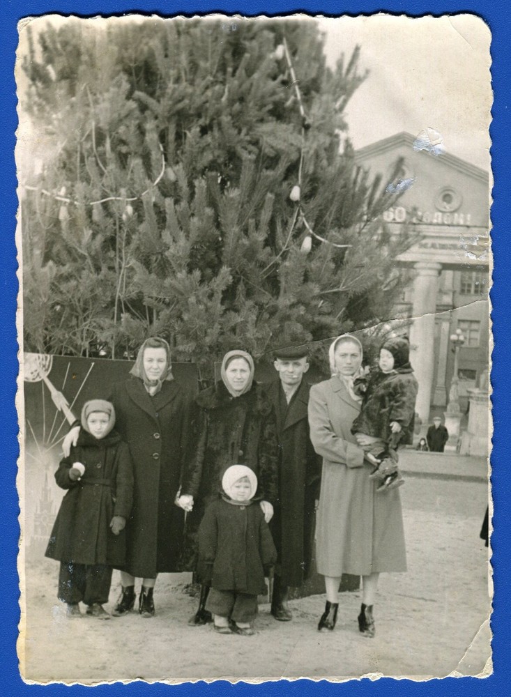 Men Women Children near a Big Decorated Christmas Tree, Soviet New Year Photo-image
