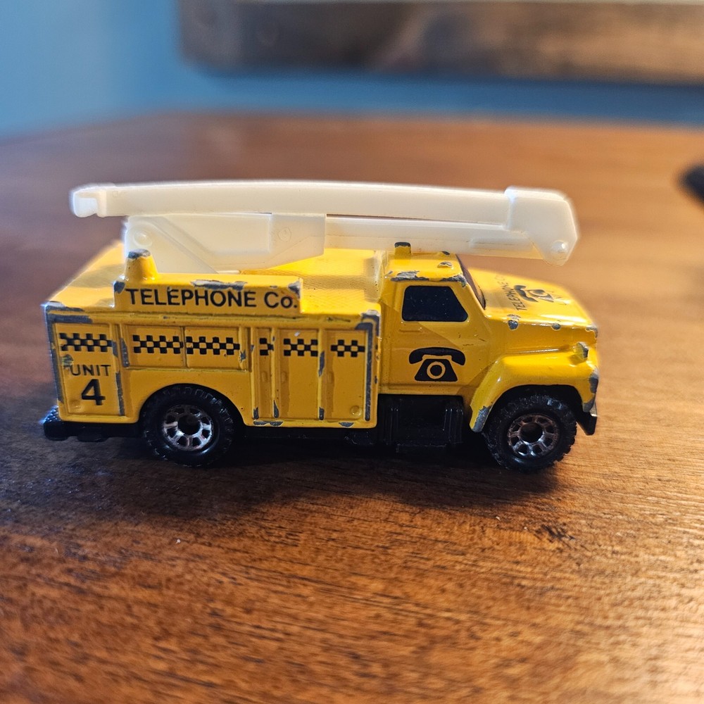Vintage 1989 Matchbox Telephone Co. Utility Truck Cherry Picker, yellow