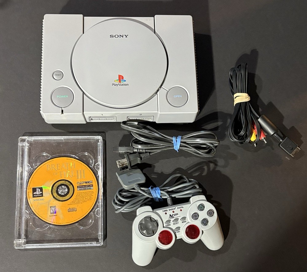 Sony PS1 Console with Cords Controller and Breath of Fire 3 Game