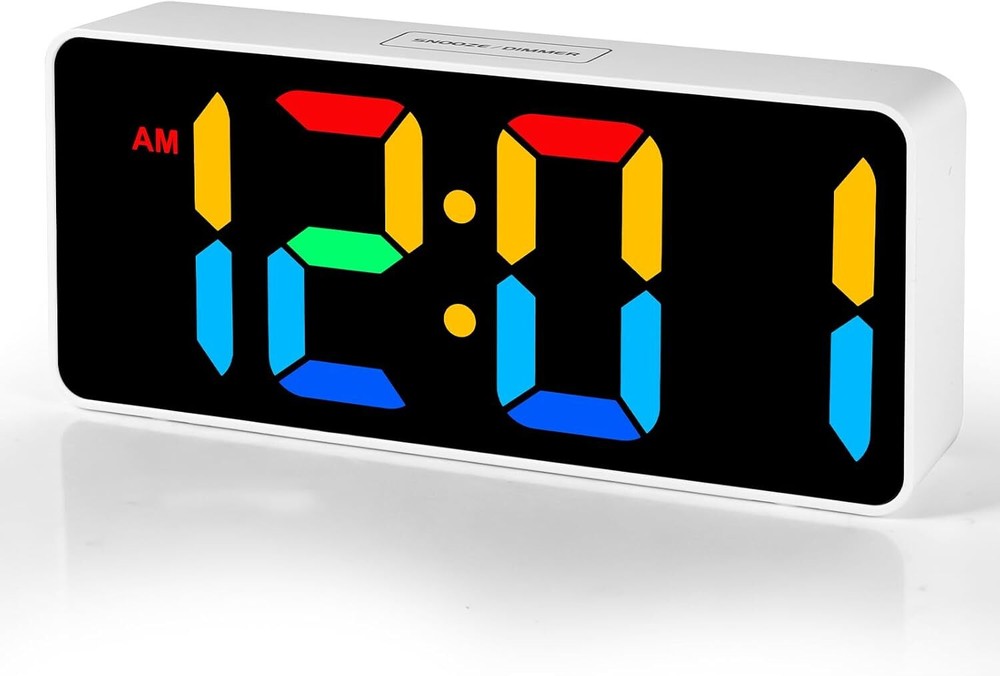Compact digital bedside alarm clock with adjustable brightness