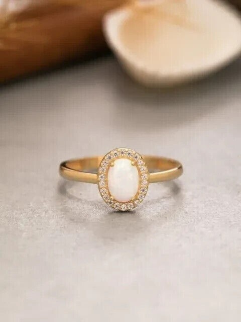 Oval Cut Simulated Fire Opal Women's Halo Wedding Ring In 14K Yellow Gold Plated