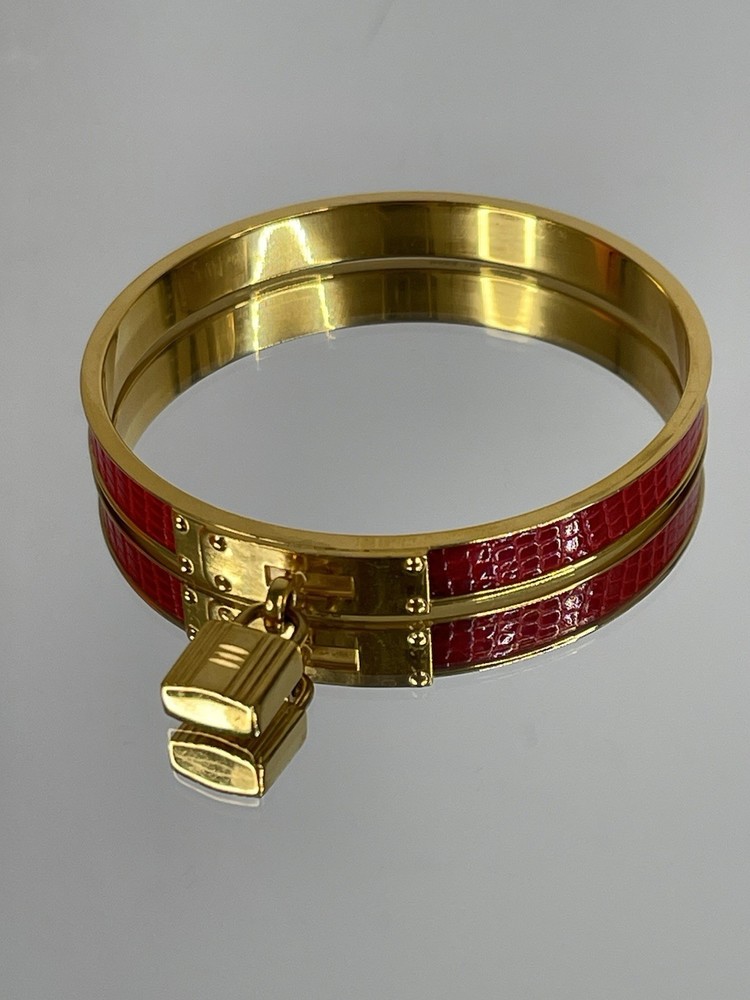 HERMES Kelly Cadena Gold Tone Bangle Bracelet Elegant Designer Jewelry