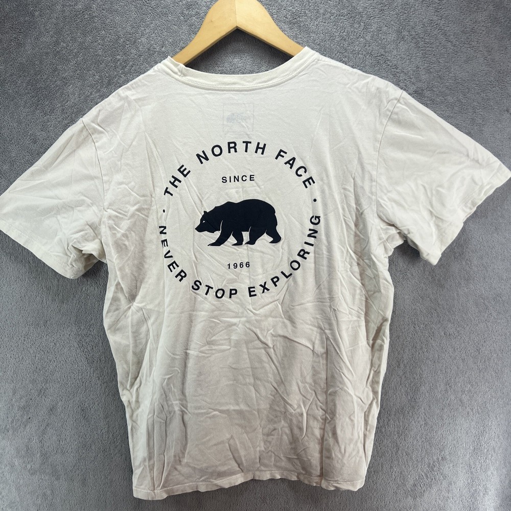 The North Face Bear Graphic Cream Off White 1966 Retro Men’s Tee Never Stop Exploring