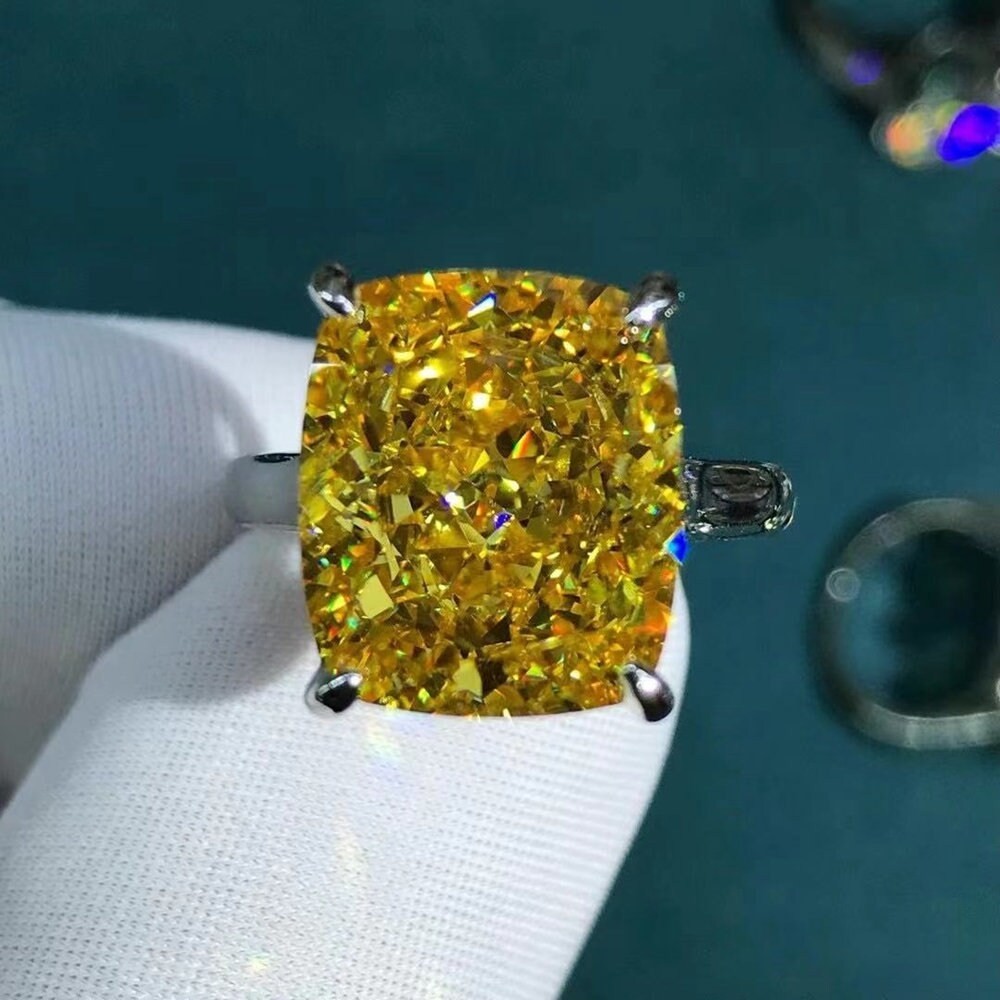 11 Carat Cushion Moissanite Ring in 10K Yellow Gold with 4-Claw Cathedral Basket Setting