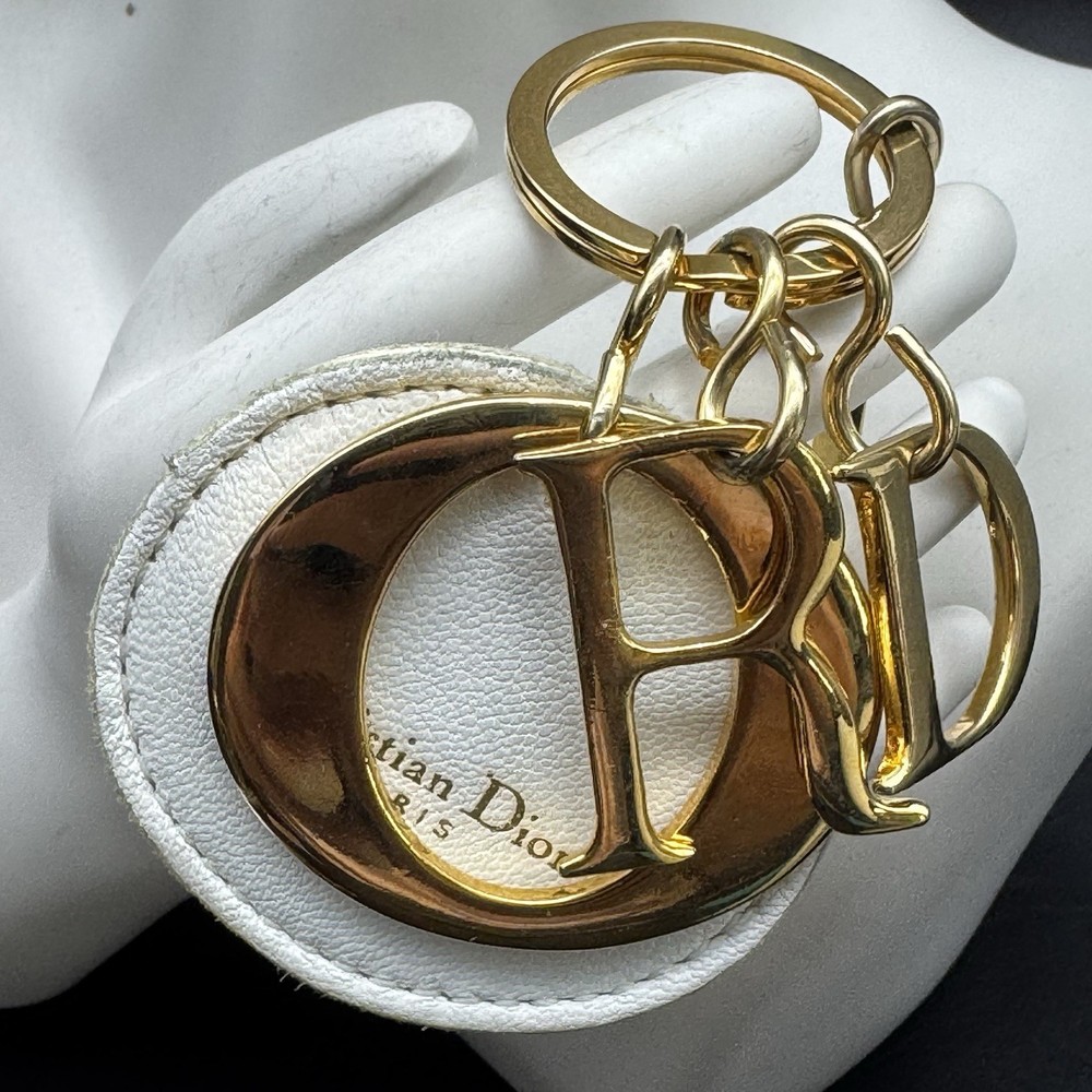 Vintage Dior Gold Keychain with White Leather Logo Charm 2.25x3.375