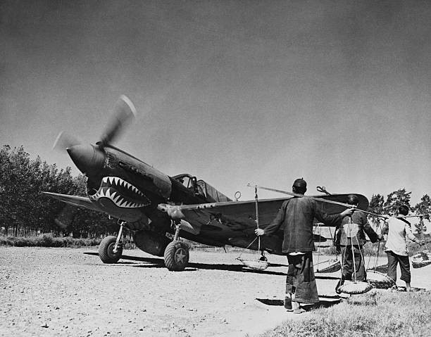 Repaired Flying Tiger aircraft takes off from the taxi strip of a - Old Photo