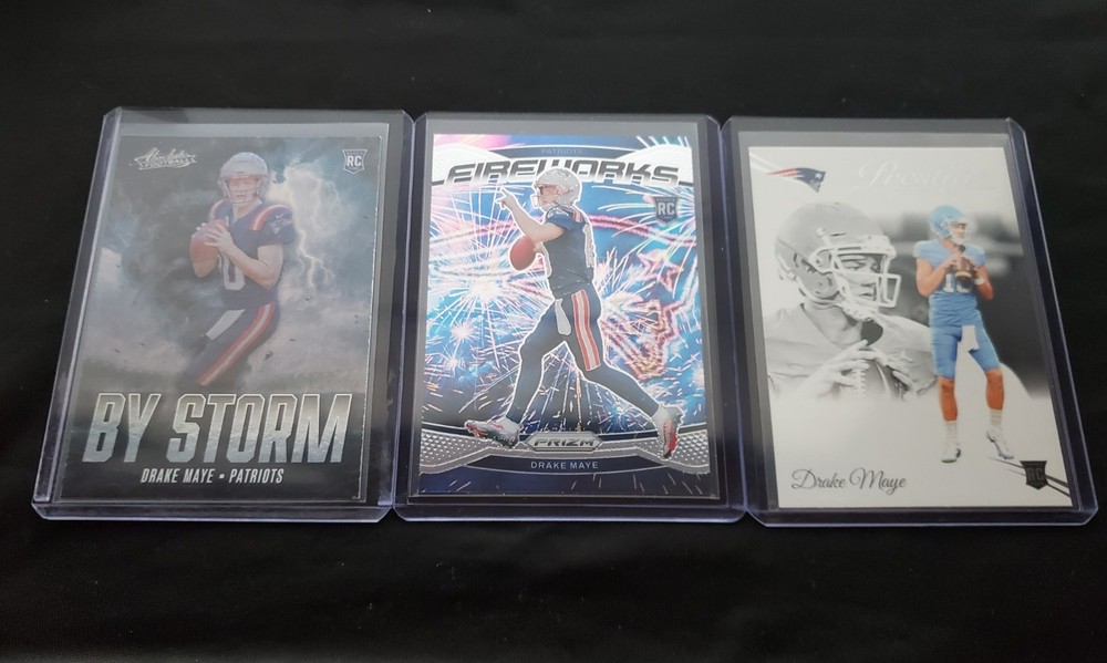 2024 Drake Maye Silver Fireworks Rookie Lot: Prestige White RC And By Storm RC