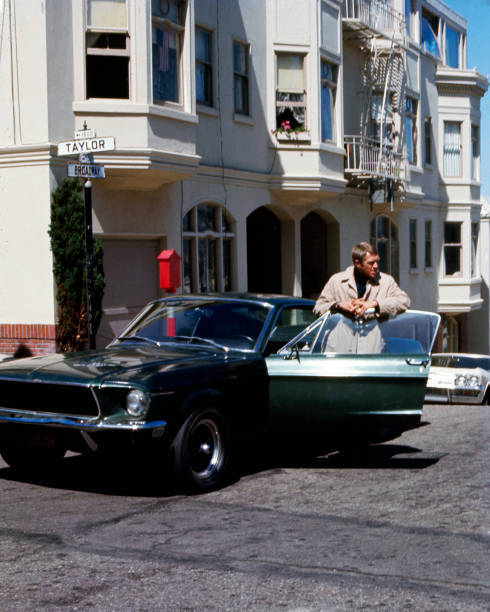 Steve McQueen as Frank Bullit next to a Ford Mustang 390 GT 2+2 Fa- Old Photo