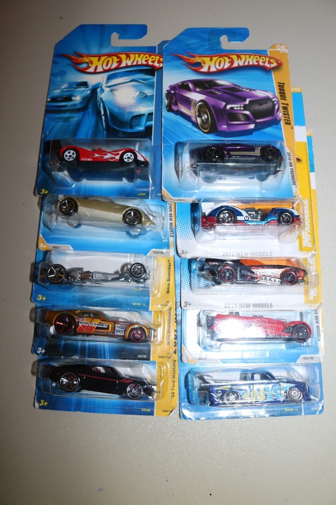 Hot Wheels Cars lot of 10 new models various years fair cards NIP good cars-image