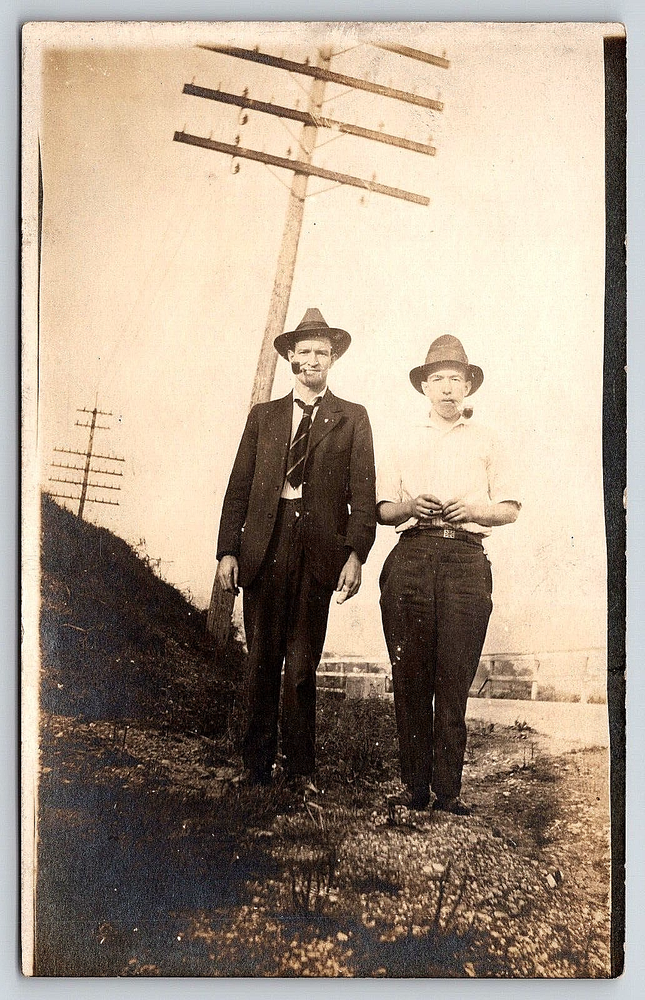 Vintage Outdoor Photo Postcard of Men in Suits with Hats and Smoking Pipes