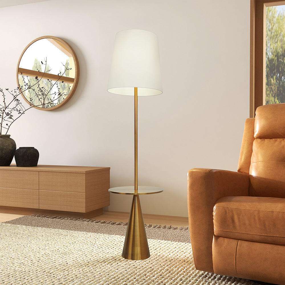 Modern brass-accented floor lamp with side table and white shade