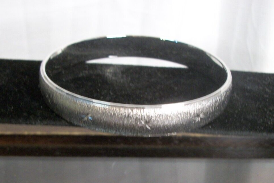 MONET Bracelet Bangle Silver Toned Etched Snowflakes Signed