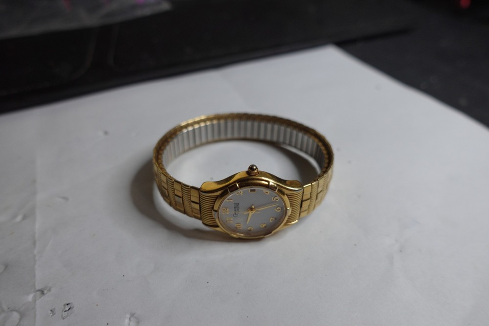 Ladies Caravelle Bulova Quartz Watch Gold tone with Date NEW BATTERY