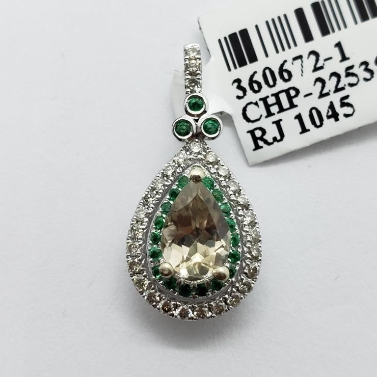White gold pendant studded with emeralds, diamonds, and zultanite centerpiece