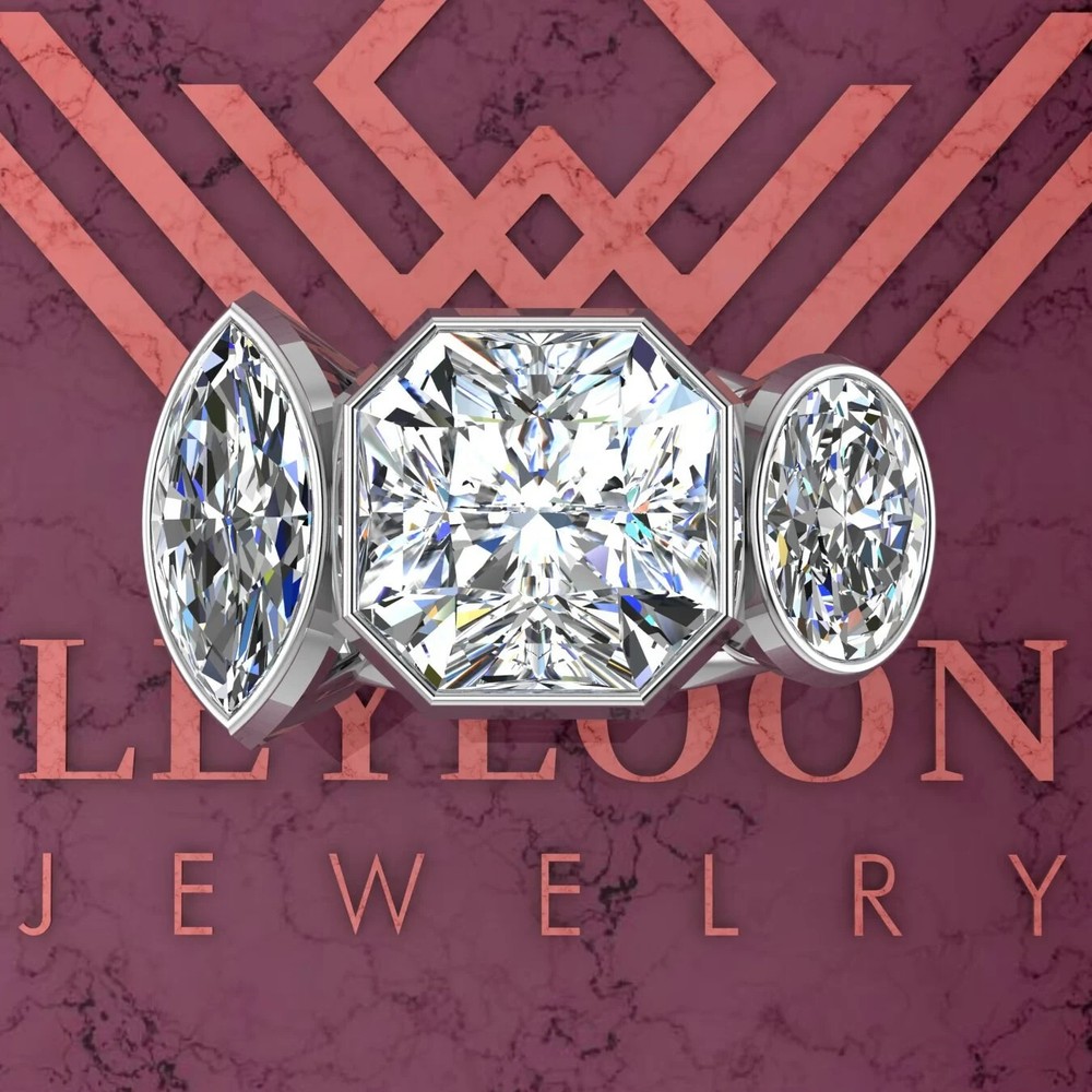 4.1 CTW D Color Radiant Cut Moissanite Three-Stone Bezel Ring in 10K Gold