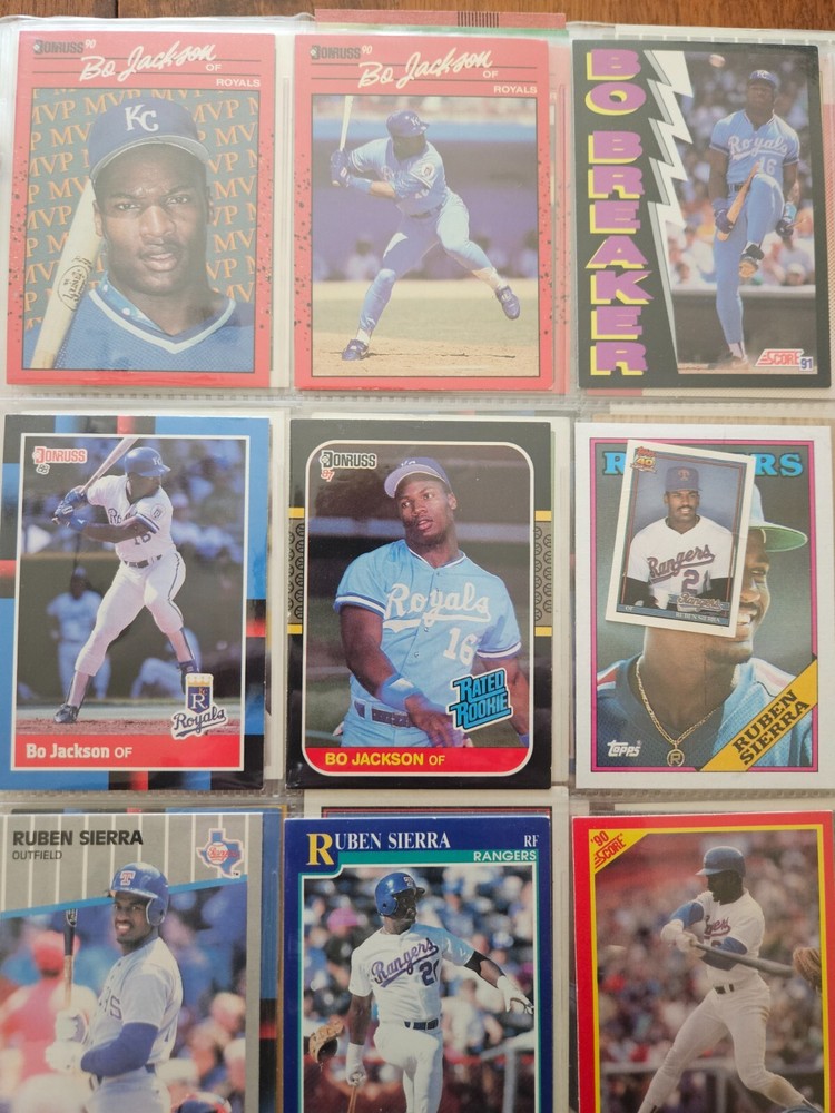 Massive 400+ card sports lot with MVP and Hall of Fame players in binder