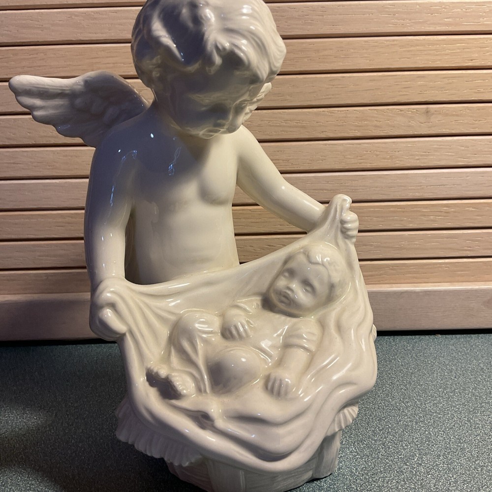 Ceramic Angel Figurine Holding Baby in Blanket