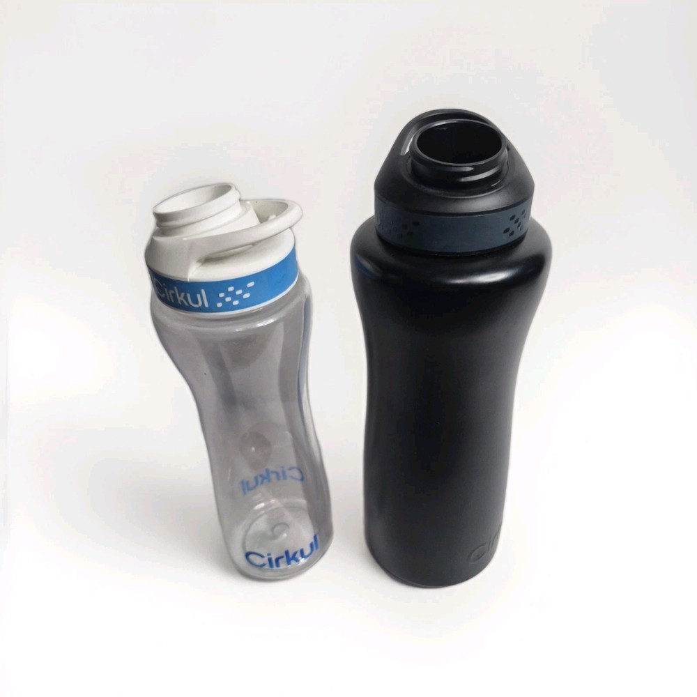 2 Cirkul Bottles.  One is stainless and other is plastic Water Bottle Only