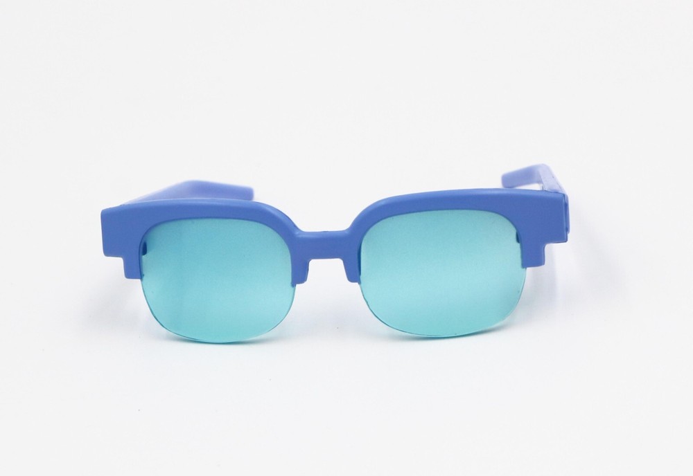 American Girl A pair of blue sunglasses from Corinne’s Accessories for 18'' doll