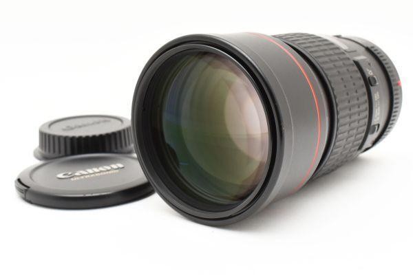 Canon EF 200mm F2.8L USM Lens with minor hood and front scratches