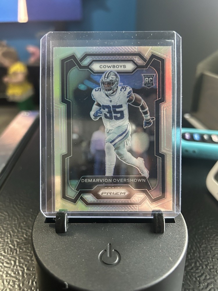 2023 Panini Prizm Football Demarvion Overshown Silver Prizm Rookie RC Cowboys