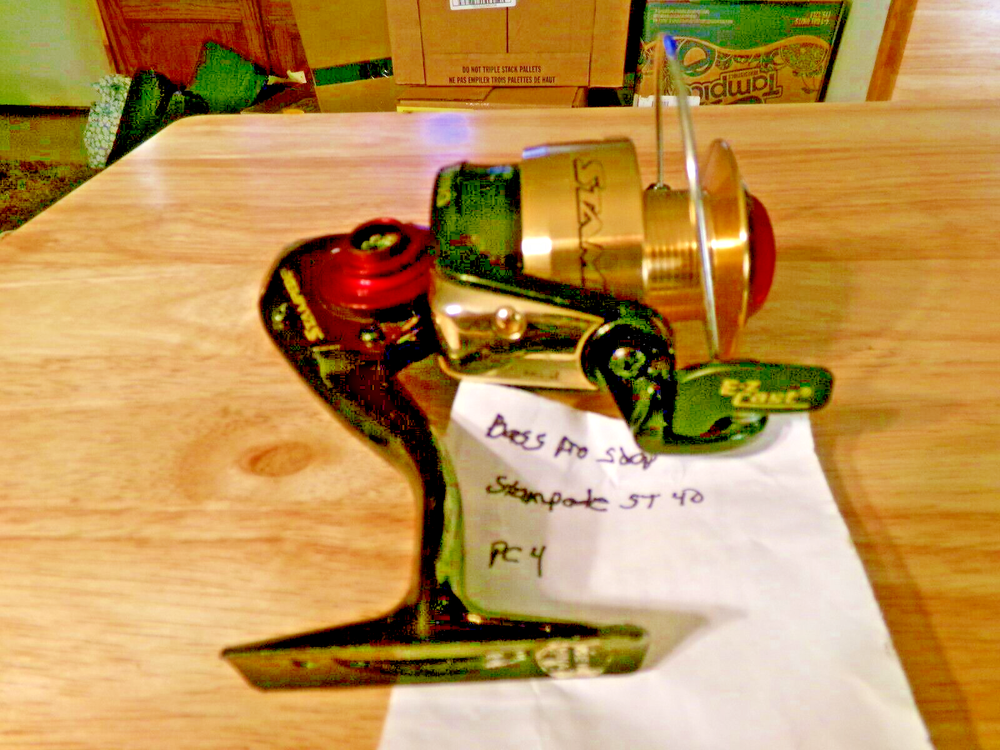 FISHING REEL BASS PRO SHOP STAMPDE FOR PARTS ONLY-NO REEL HANDLE