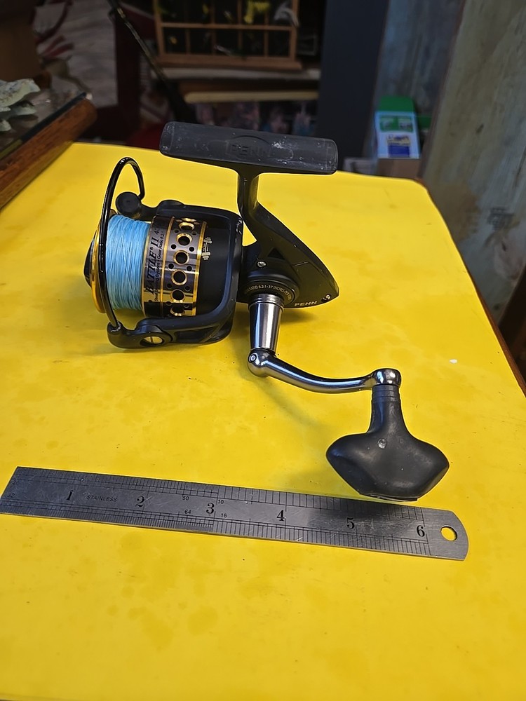 penn battle ll 4000 Loaded With Medium Blue Braid  Nice Reel!