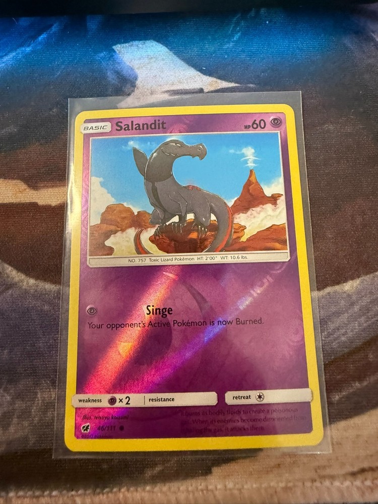 Salandit 46/111 Sm-Crimson Invasion Reverse Holo