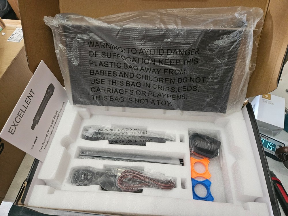 Dual Channel UHF Wireless Mic System with 2 Metal Handheld Mics for Professionals