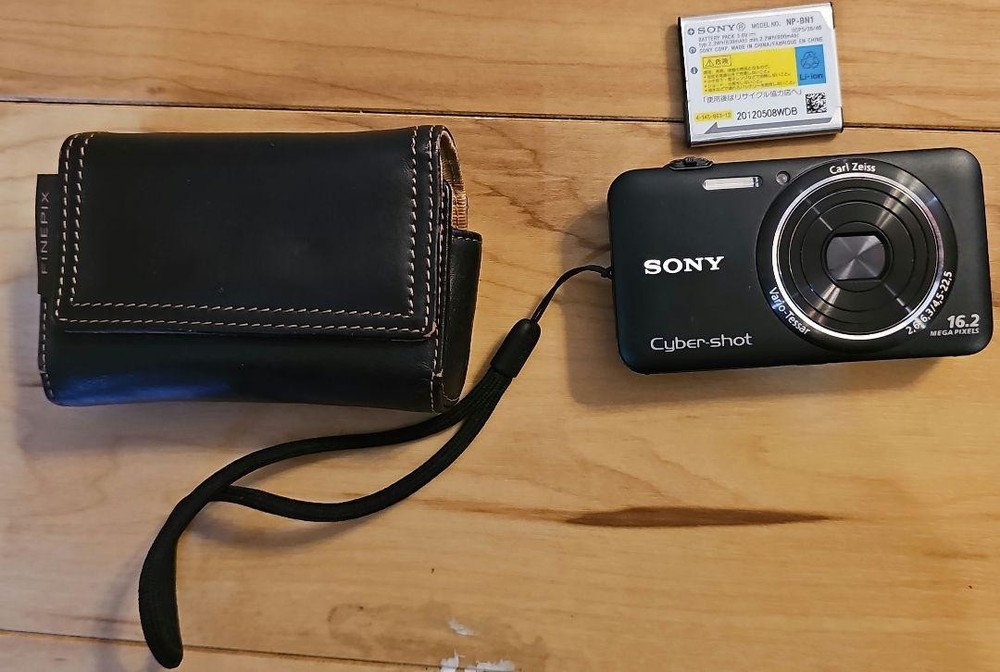 Sony Cyber-shot 16.2MP Digital Camera with Carl Zeiss Lens Case Battery Included
