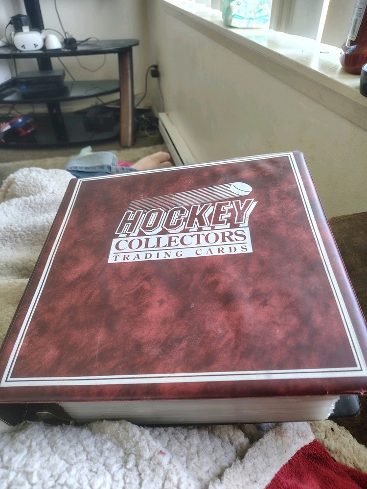 big binder full of miscellaneous NHL Cards